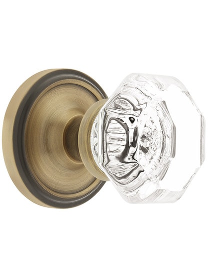 Classic Rosette Door Set With Waldorf Crystal Door Knobs in Antique Brass.